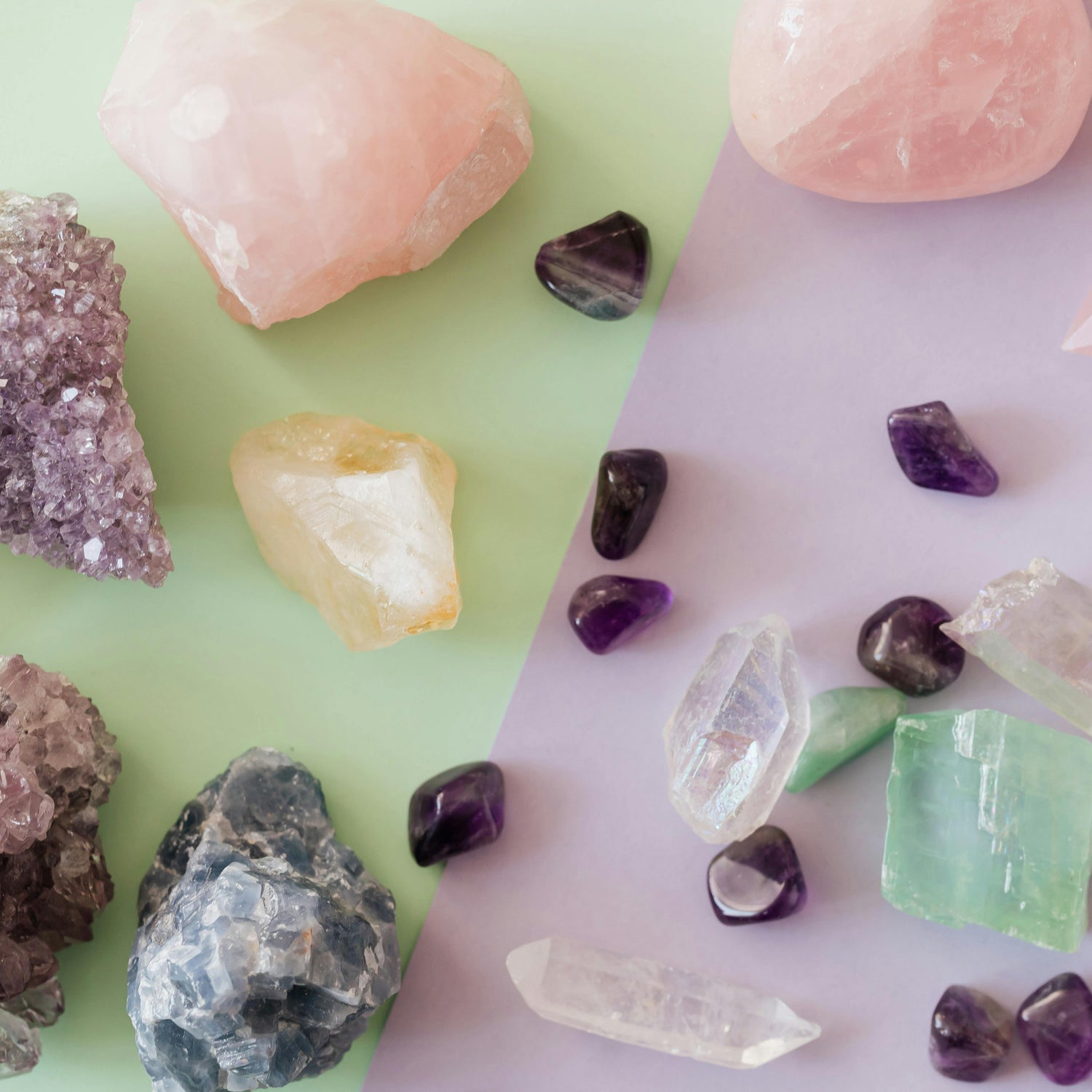 Collection of various crystals and stones on a light green and white background